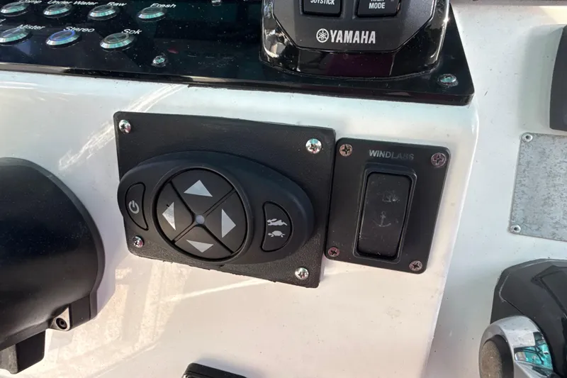Slide: The Image of Control panel of a 2019 Century 3200 Center Console boat with Yamaha joystick. - 60