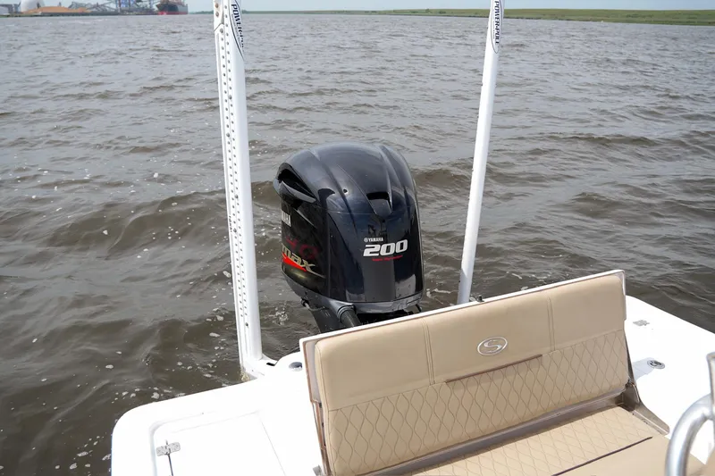 Slide: The Image of 2018 Sportsman Tournament 214 Bay Boat with Yamaha 200 engine on water. - 8