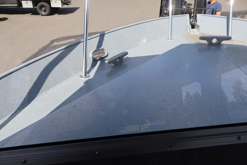 Slide: The Image of Bow view of 2026 KingFisher 2825 Coastal Express boat, showcasing deck and cleats. - 29