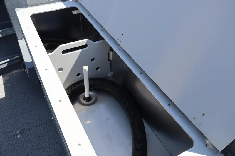 Slide: The Image of Storage compartment of 2026 KingFisher 2825 Coastal Express boat, featuring interior details. - 9