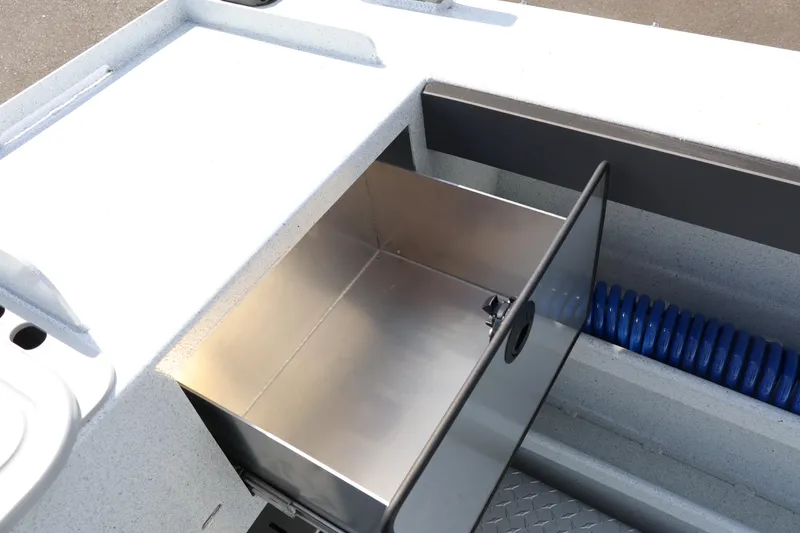 Slide: The Image of Interior storage compartment of 2026 KingFisher 2425 Escape HT boat. - 13