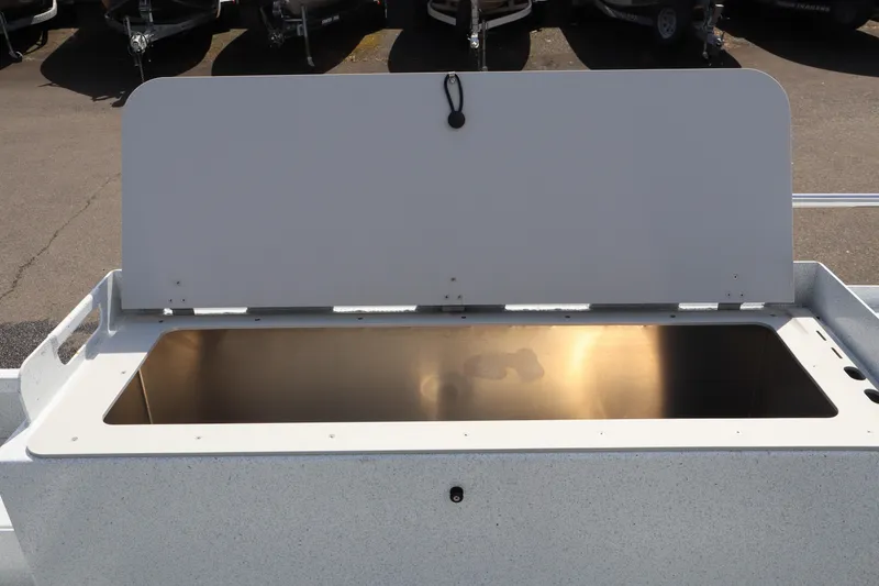 Slide: The Image of Open storage compartment on 2026 KingFisher 2425 Escape HT boat. - 8