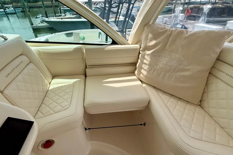 Slide: The Image of Luxurious interior of 2021 Grady-White Express 370 boat with plush seating and elegant design. - 13