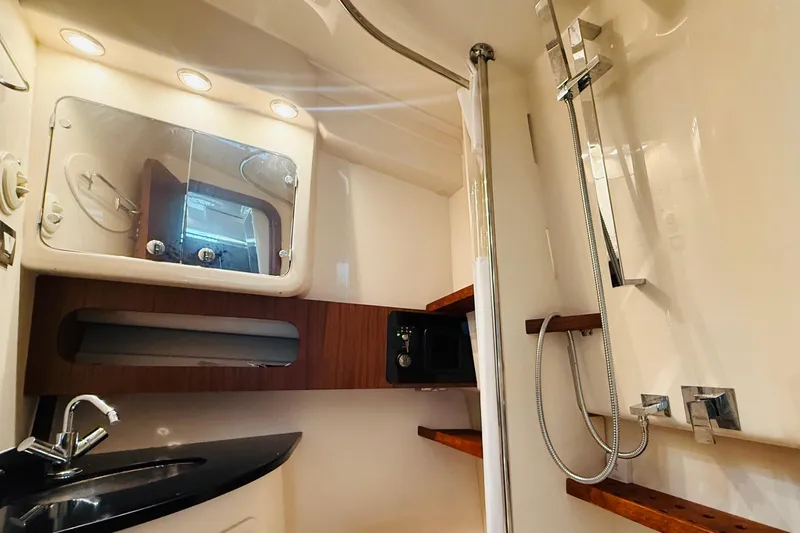 Slide: The Image of Luxurious bathroom interior of 2021 Grady-White Express 370 boat with modern fixtures. - 28
