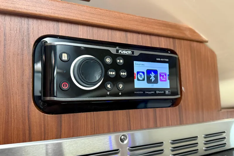 Slide: The Image of Fusion MS-AV755 stereo system on 2021 Grady-White Express 370 boat, featuring Bluetooth connectivity. - 33