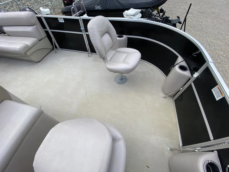 Slide: The Image of Interior of a 2015 Starcraft Freedom 180 Tiller boat with seating. - 10