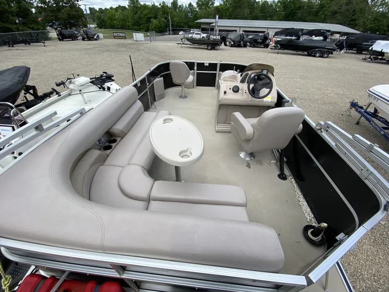 Slide: The Image of 2015 Starcraft Freedom 180 Tiller boat with beige interior. - 13