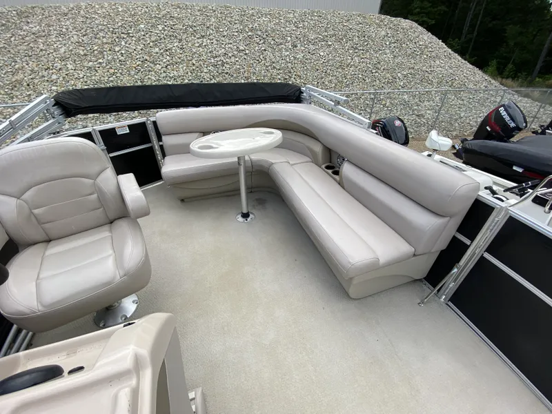Slide: The Image of Interior of a 2015 Starcraft Freedom 180 Tiller boat with seating area. - 3