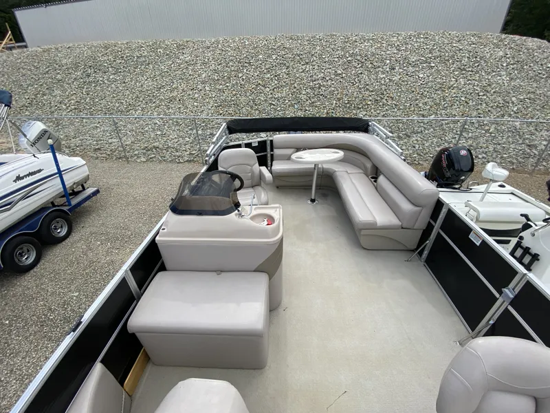 Slide: The Image of Interior view of a 2015 Starcraft Freedom 180 Tiller pontoon boat. - 9