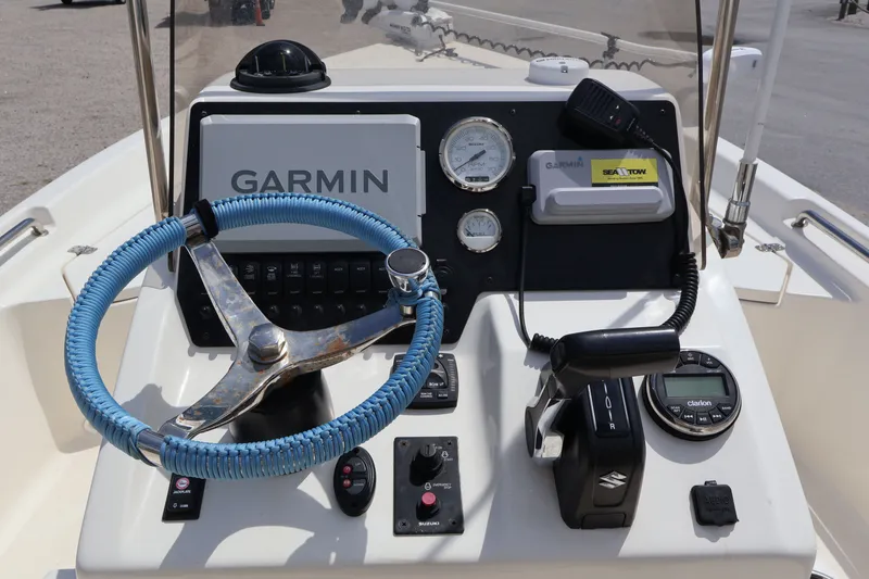 Slide: The Image of Control console of a 2023 Bulls Bay 2000 boat with Garmin navigation. - 10