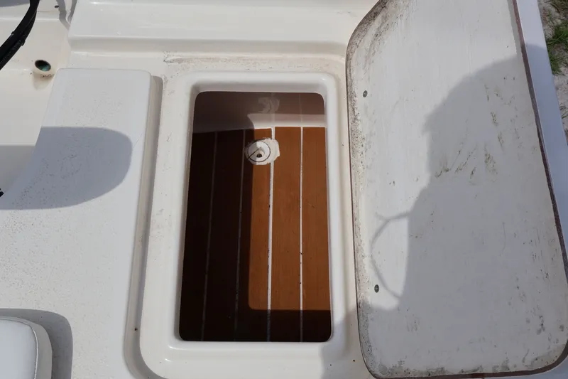 Slide: The Image of Open storage compartment on a 2023 Bulls Bay 2000 boat. - 18