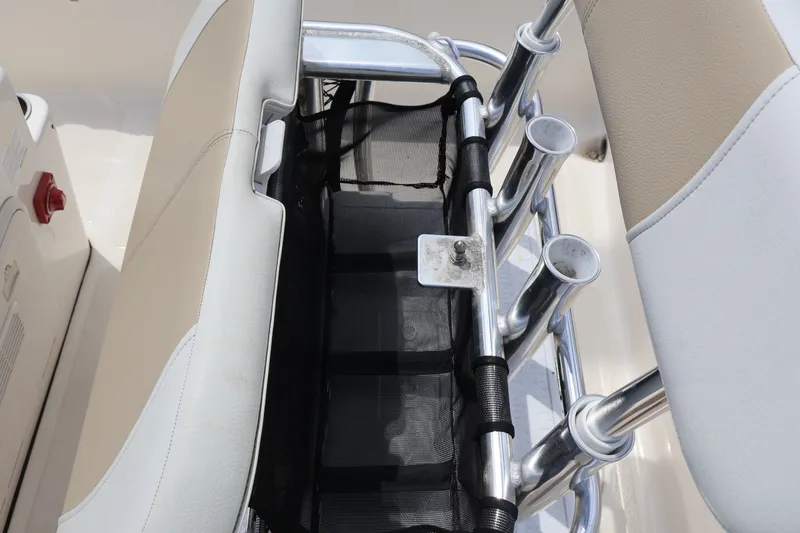 Slide: The Image of Bulls Bay 2000 boat seat with fishing rod holders, year 2023. - 19