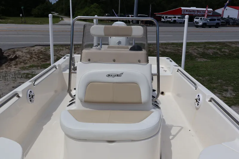 Slide: The Image of Interior view of a 2023 Bulls Bay 2000 boat, beige upholstery. - 23