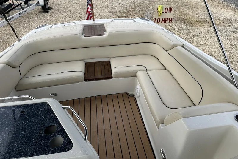Slide: The Image of Luxurious 2005 Chris-Craft Launch 28 boat interior with elegant seating and wooden flooring. - 17