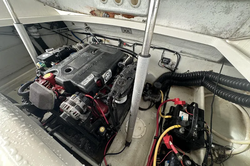Slide: The Image of Engine compartment of a 2005 Chris-Craft Launch 28 boat, featuring a Volvo Penta engine. - 5