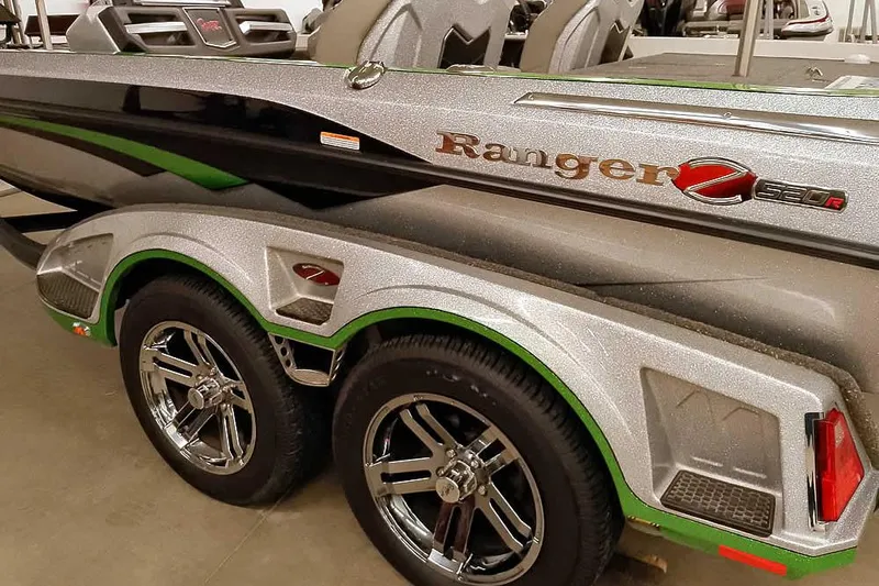 Slide: The Image of 2025 Ranger Z520R boat trailer with sleek design and chrome wheels. - 10