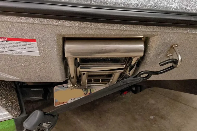 Slide: The Image of 2025 Ranger Z520R boat ladder and hitch detail in a garage setting. - 11