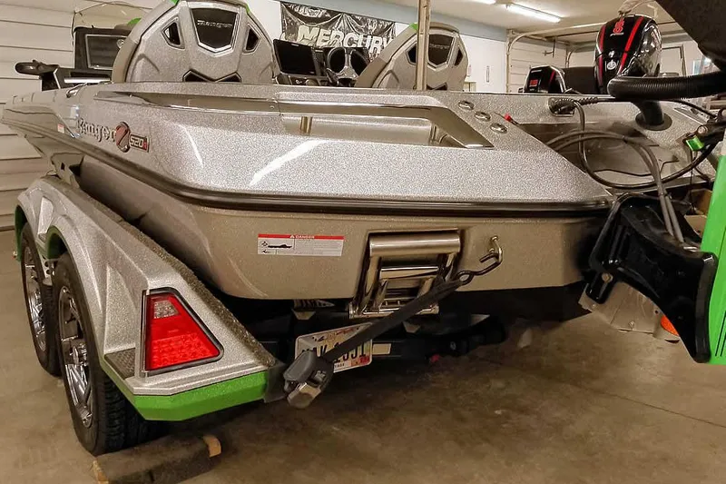Slide: The Image of 2025 Ranger Z520R boat in garage, showcasing sleek design and modern features. - 12
