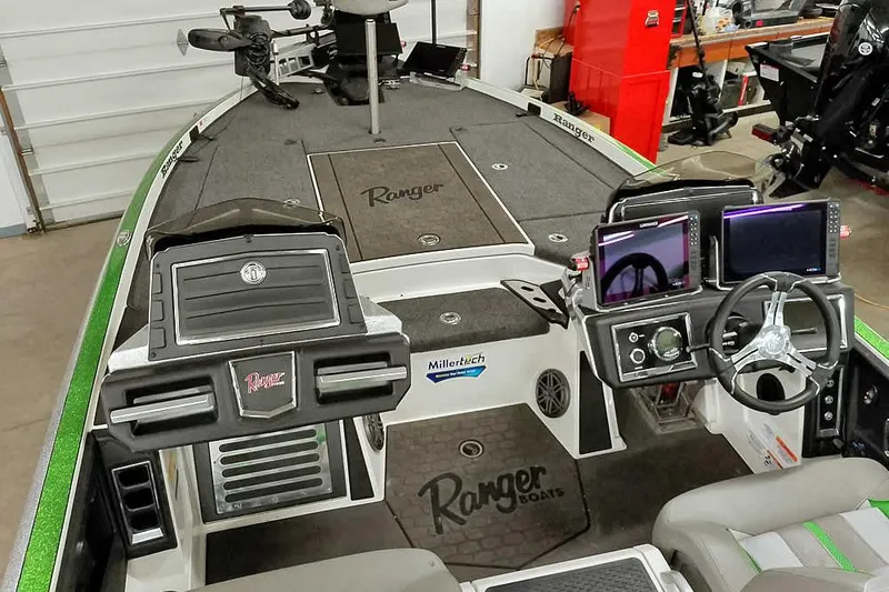 Slide: The Image of 2025 Ranger Z520R boat interior with advanced navigation systems and sleek design. - 15