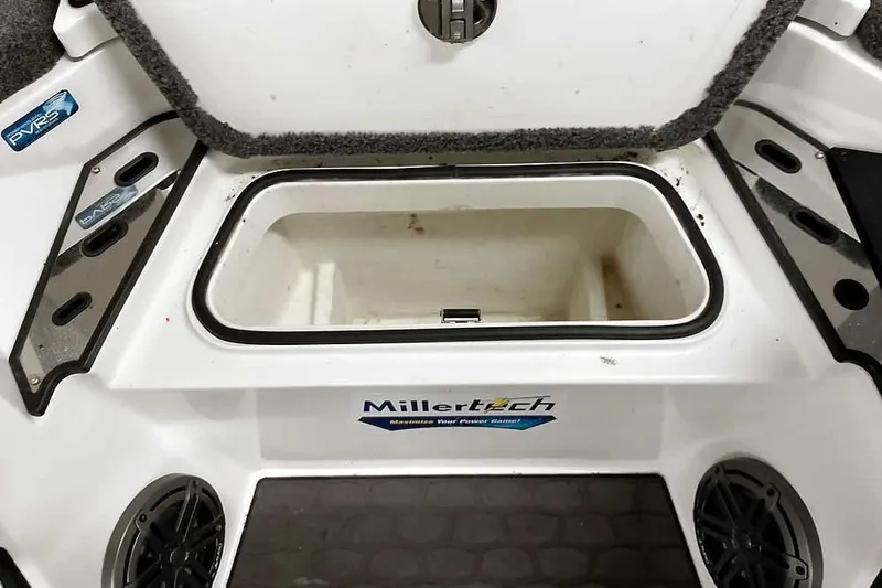 Slide: The Image of 2025 Ranger Z520R boat storage compartment with MillertTech branding and speaker system. - 17