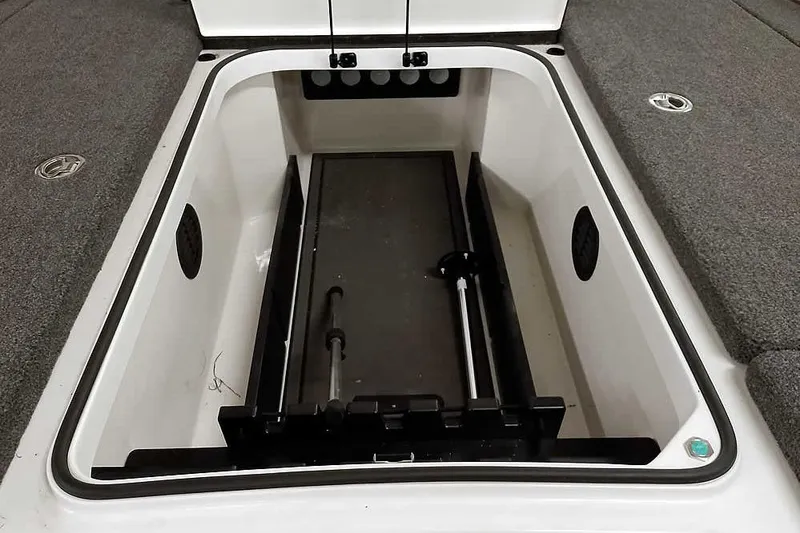 Slide: The Image of 2025 Ranger Z520R boat storage compartment with organized interior and secure latches. - 18