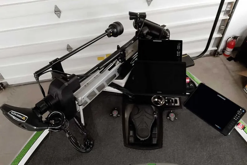 Slide: The Image of 2025 Ranger Z520R boat dashboard with advanced electronics and control systems. - 23