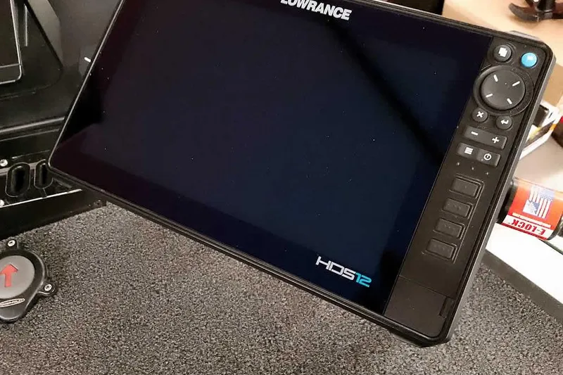 Slide: The Image of Lowrance HDS12 display on 2025 Ranger Z520R boat dashboard. - 24
