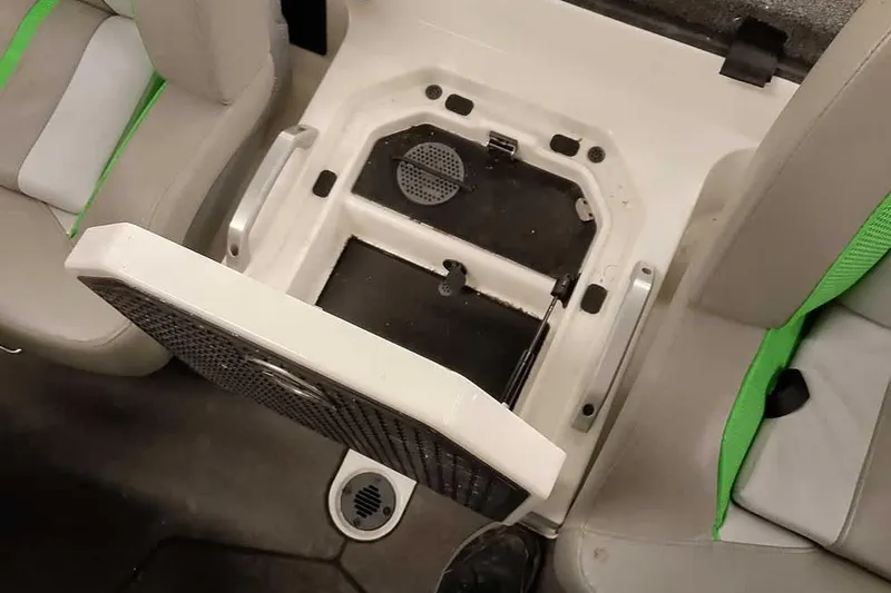 Slide: The Image of Interior storage compartment of 2025 Ranger Z520R boat with open hatch and seating. - 28