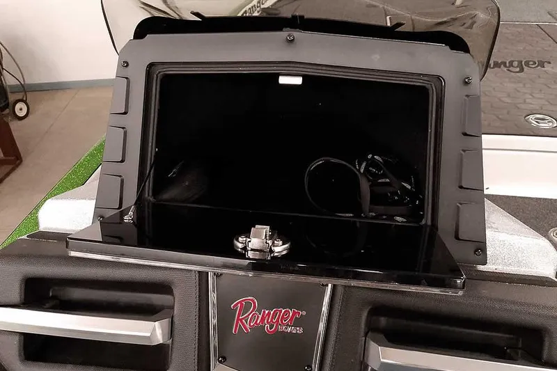 Slide: The Image of 2025 Ranger Z520R boat storage compartment with open lid, showcasing interior space and design. - 30