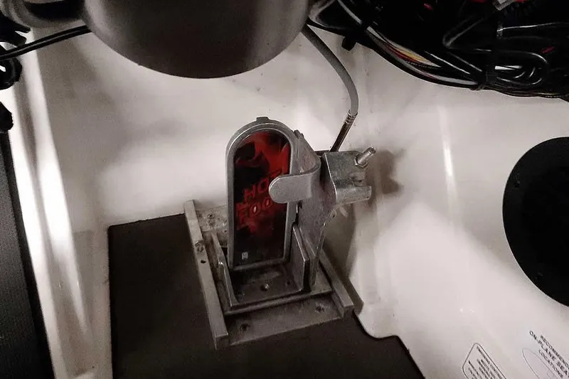 Slide: The Image of Throttle control mechanism in a 2025 Ranger Z520R boat, featuring a "Hot Foot" pedal. - 38
