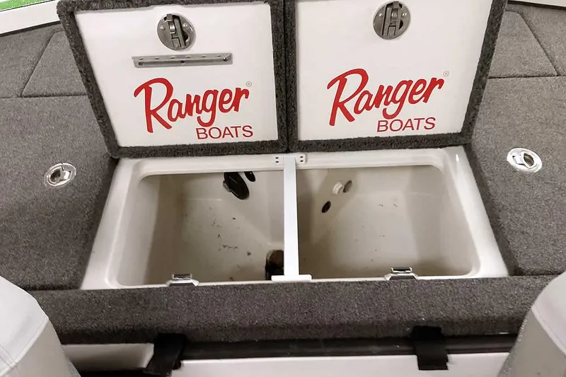 Slide: The Image of 2025 Ranger Z520R boat storage compartments with Ranger Boats branding. - 39