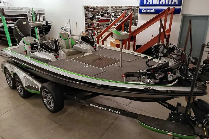 Slide: The Image of 2025 Ranger Z520R bass boat in showroom, featuring sleek design and advanced fishing technology. - 46