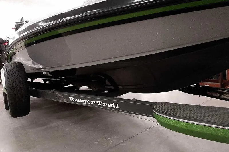 Slide: The Image of 2025 Ranger Z520R boat on Ranger Trail trailer, showcasing sleek design and sturdy build. - 5