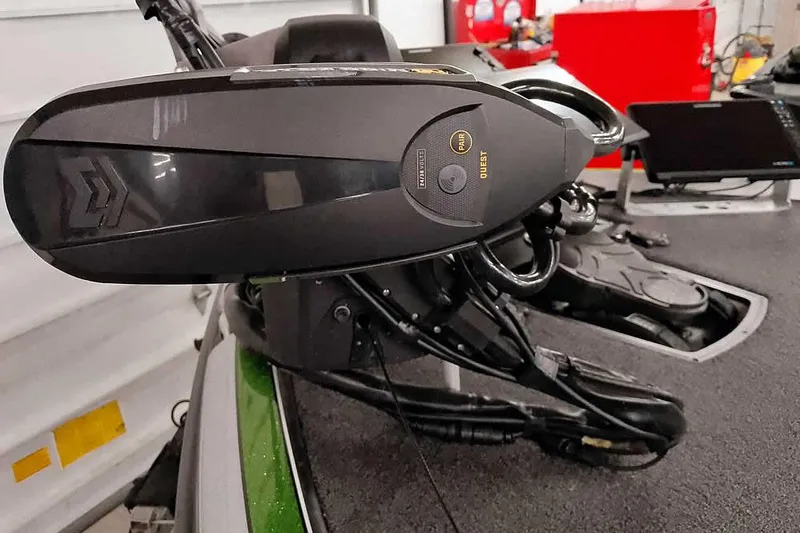 Slide: The Image of 2025 Ranger Z520R boat with advanced trolling motor in a workshop setting. - 8