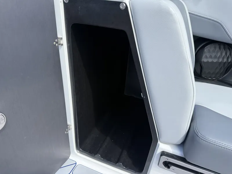 Slide: The Image of Storage compartment in 2022 Malibu Wakesetter 25 LSV boat. - 16