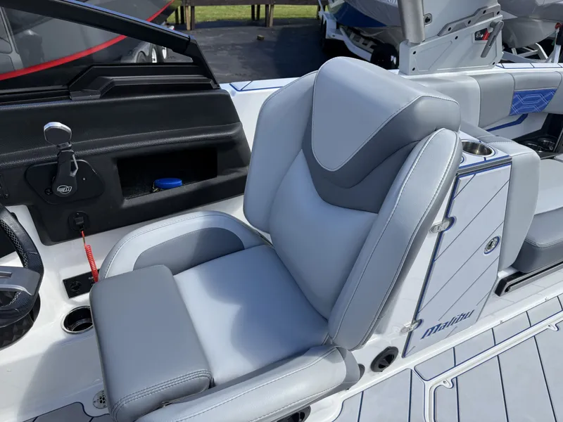 Slide: The Image of Interior of 2022 Malibu Wakesetter 25 LSV with gray seat. - 19