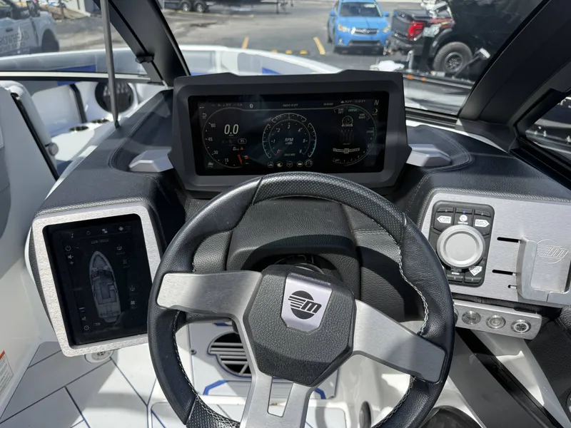 Slide: The Image of 2022 Malibu Wakesetter 25 LSV helm with modern displays. - 20