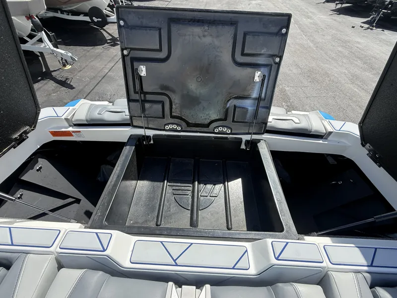 Slide: The Image of 2022 Malibu Wakesetter 25 LSV rear storage compartment. - 28