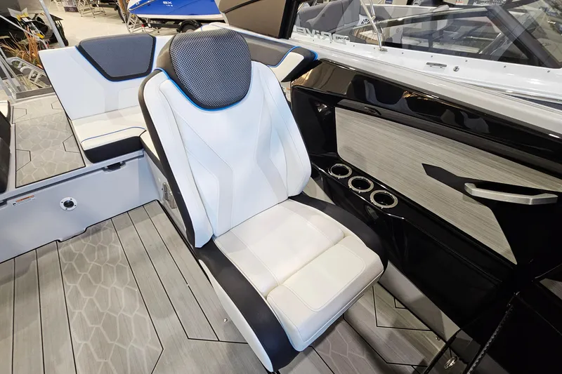 Slide: The Image of 2023 Yamaha Boats 222XD interior with sleek seating and modern design elements. - 11