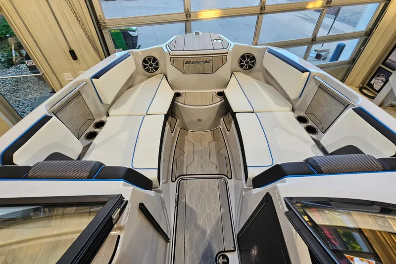 Slide: The Image of 2023 Yamaha Boats 222XD interior with spacious seating and modern design. - 16