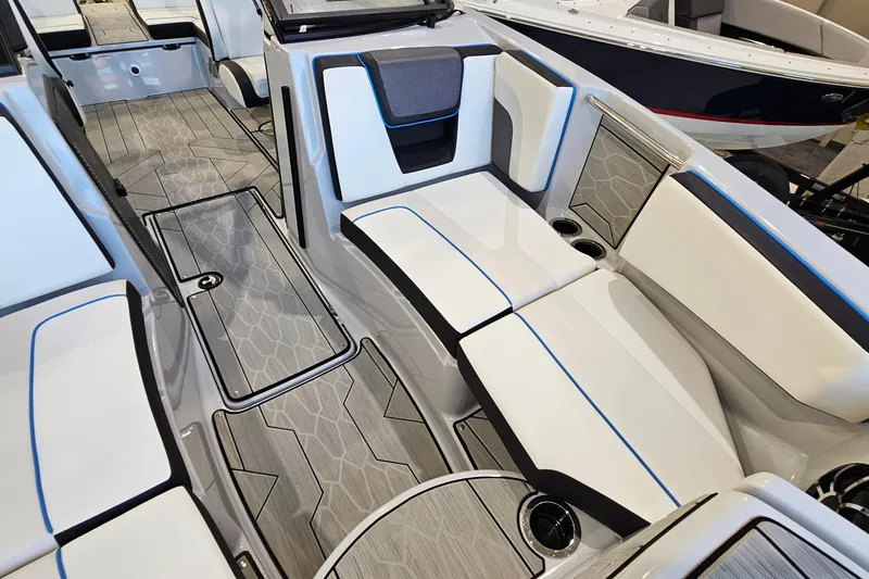Slide: The Image of 2023 Yamaha Boats 222XD interior with sleek seating and modern design. - 18