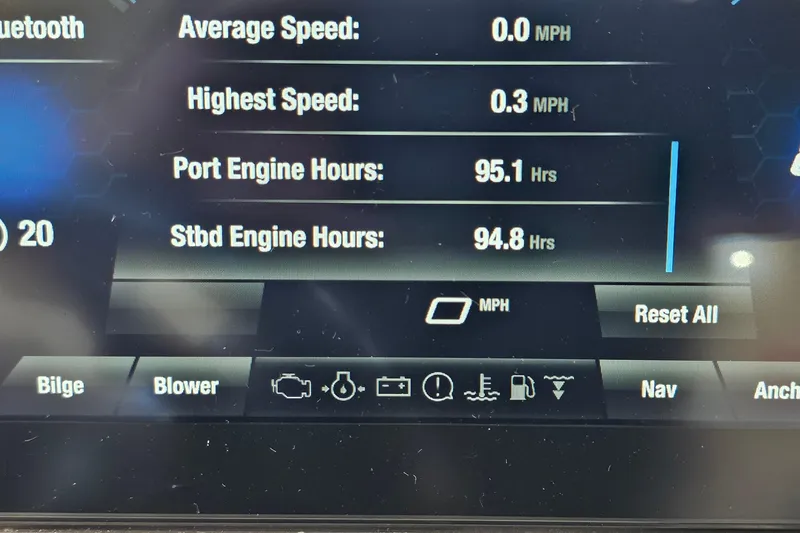 Slide: The Image of Dashboard display of 2023 Yamaha Boats 222XD showing engine hours and speed metrics. - 22