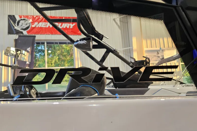 Slide: The Image of 2023 Yamaha Boats 222XD interior with "Drive" decal, showcasing modern design and technology. - 25
