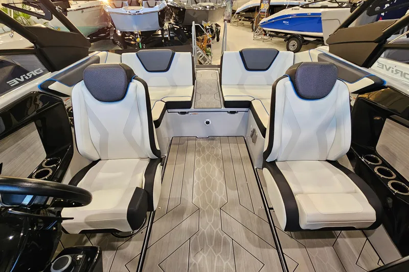 Slide: The Image of 2023 Yamaha Boats 222XD interior with modern seating and sleek design. - 7