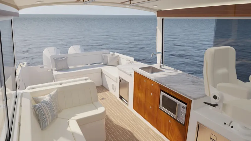 Slide: The Image of Interior of MJM Yachts 38R 2027 with modern kitchen and ocean view. - 3
