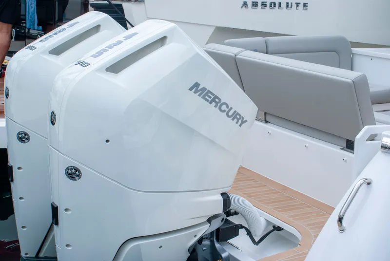 Slide: The Image of The image shows two Mercury outboard engines on a 2027 MJM Yachts 38R. - 45