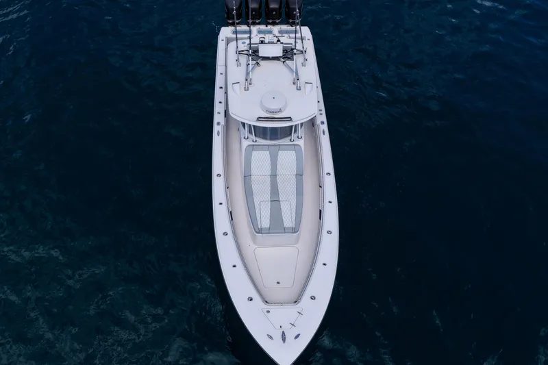 Slide: The Image of Aerial view of 2018 Contender 39 Fisharound boat on deep blue water. - 7