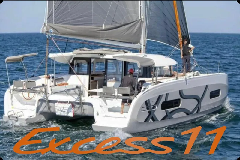 The Image of Sailing catamaran Excess 11, 2026 model, cruising on open sea with crew onboard. - 0