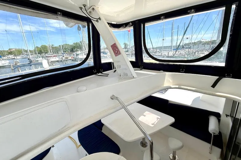 Slide: The Image of Interior view of 2010 Leopard 46 yacht with marina backdrop. - 27