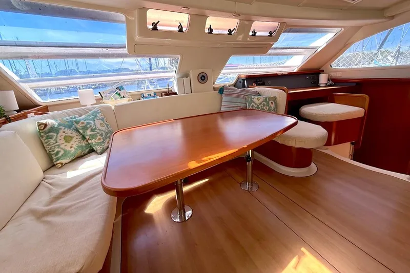 Slide: The Image of Luxurious interior of a 2010 Leopard 46 yacht with elegant seating and panoramic windows. - 48